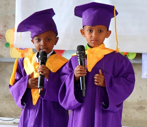 Students smiling during a school celebration